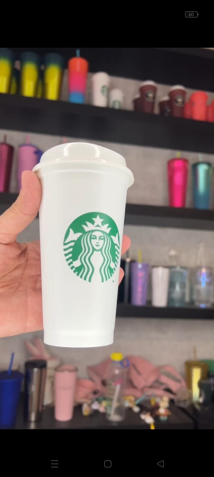 white small plastic cup from Starbucks